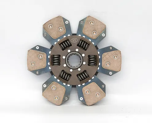 What is the function of tractor friction disc?